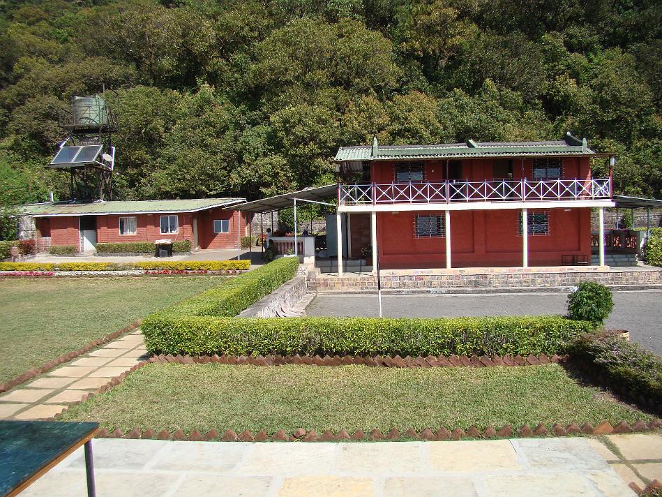 DSC02007.JPG - Puja Farm, Mahabaleshwar Facade View. The LHS structure is for office/kitchen/support staff/boiler. There are four rooms in RHS structure
